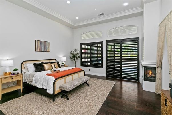 Bedroom, Fireplace, Interior, Recessed Lighting, Wood Texture Flooring