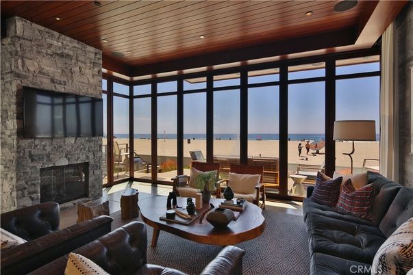 Fireplace, Interior, Living room, Recessed Lighting, Stone Walls, Water, Wooden Ceilings