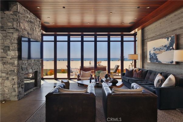 Fireplace, Interior, Living room, Recessed Lighting, Stone Walls, Water, Wooden Ceilings, Wooden Walls