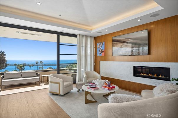 Fireplace, Interior, Living room, Recessed Lighting, Water, Wood Texture Flooring, Wooden Walls