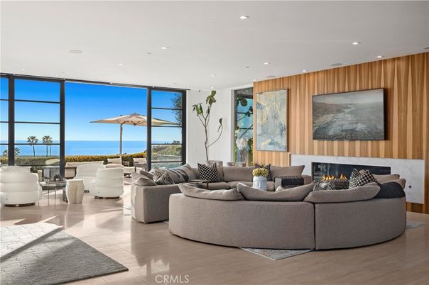 Fireplace, Interior, Living room, Recessed Lighting, Water, Wooden Walls