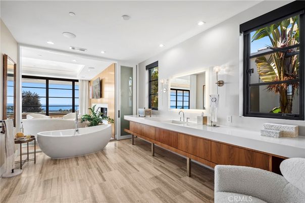Bathroom, Fireplace, Free Standing Baths, Interior, Recessed Lighting, Water, Wood Texture Flooring