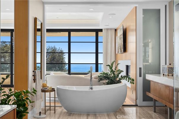 Bathroom, Fireplace, Free Standing Baths, Interior, Recessed Lighting, Water, Wood Texture Flooring