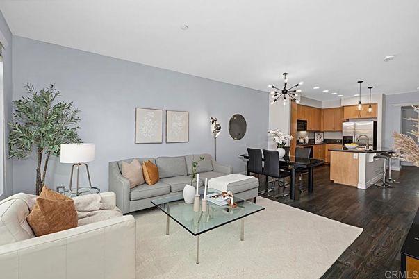 Dining room, Interior, Kitchen, Living room, Pendant Lights, Recessed Lighting, Stainless Steel Appliances, Wood Texture Flooring