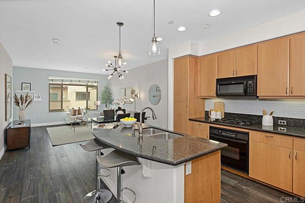 Dining room, Interior, Kitchen, Living room, Pendant Lights, Recessed Lighting, Stainless Steel Appliances, Wood Texture Flooring
