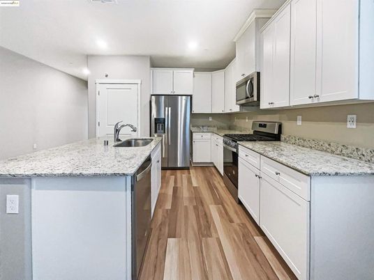 Interior, Kitchen, Recessed Lighting, Stainless Steel Appliances, Wood Texture Flooring