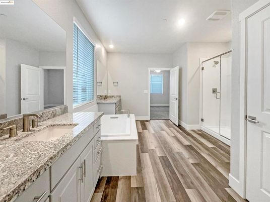 Bathroom, Dual Sink Vanities, Glass Shower, Interior, Recessed Lighting, Wood Texture Flooring