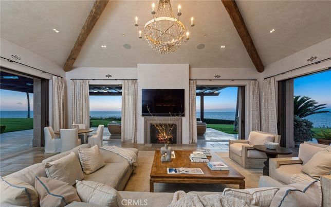 Chandelier, Fireplace, Interior, Living room, Recessed Lighting, Water, Wooden Beams