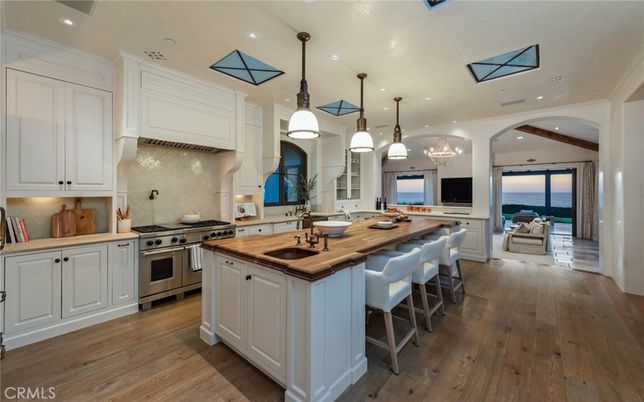 Chandelier, Interior, Kitchen, Pendant Lights, Recessed Lighting, Stainless Steel Appliances, Water, Wood Texture Flooring