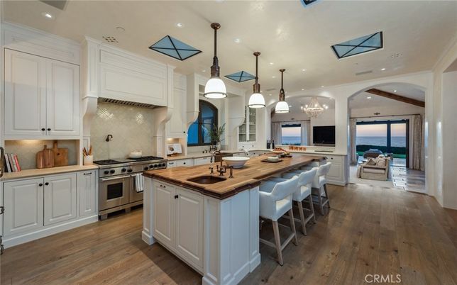 Chandelier, Interior, Kitchen, Pendant Lights, Recessed Lighting, Stainless Steel Appliances, Water, Wood Texture Flooring