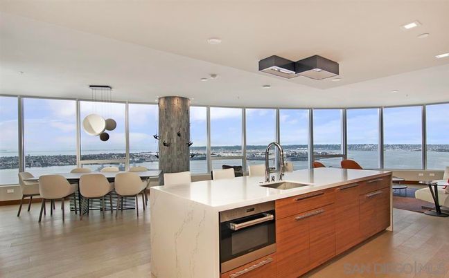 Dining room, Interior, Kitchen, Pendant Lights, Recessed Lighting, Stainless Steel Appliances, Water, Wood Texture Flooring