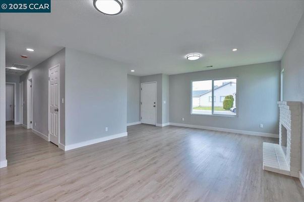 Empty room, Fireplace, Interior, Recessed Lighting, Wood Texture Flooring