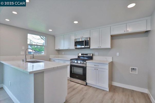 Interior, Kitchen, Recessed Lighting, Stainless Steel Appliances, Wood Texture Flooring