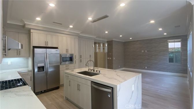 Interior, Kitchen, Pendant Lights, Recessed Lighting, Stainless Steel Appliances, Wood Texture Flooring