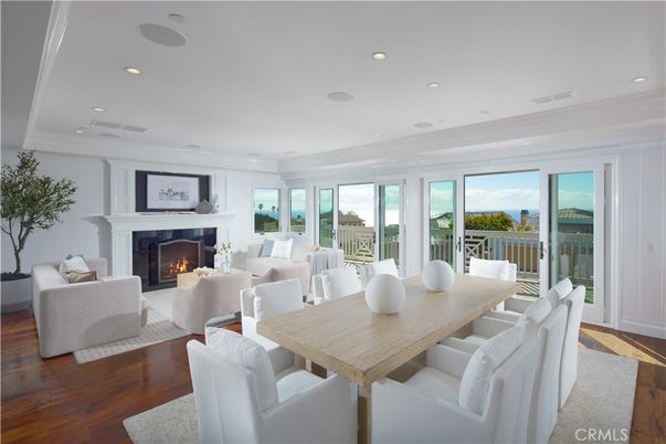 Dining room, Fireplace, Interior, Living room, Recessed Lighting, Wood Texture Flooring