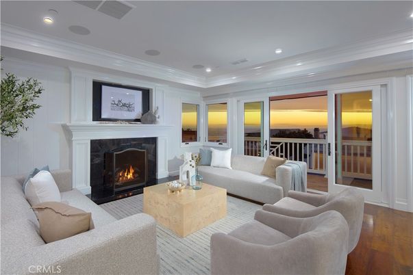 Fireplace, Interior, Living room, Recessed Lighting, Water, Wood Texture Flooring