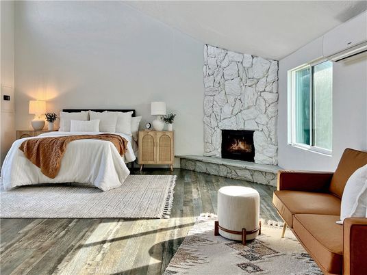 Bedroom, Fireplace, Interior, Stone Walls, Wood Texture Flooring