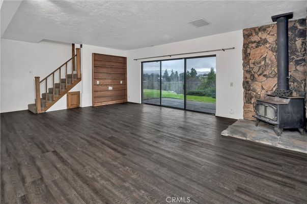 Empty room, Fireplace, Interior, Stone Walls, Wood Texture Flooring