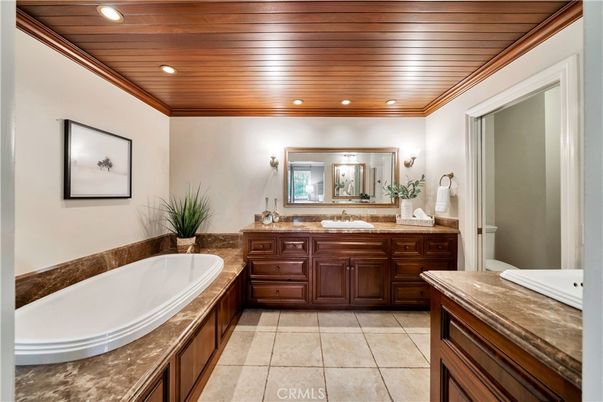 Bathroom, Dual Sink Vanities, Interior, Recessed Lighting, Wooden Ceilings