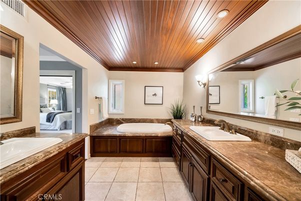 Bathroom, Dual Sink Vanities, Interior, Recessed Lighting, Wooden Ceilings