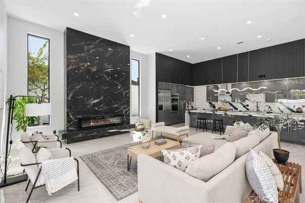 Fireplace, Interior, Kitchen, Living room, Marble Walls, Pendant Lights, Recessed Lighting, Stainless Steel Appliances