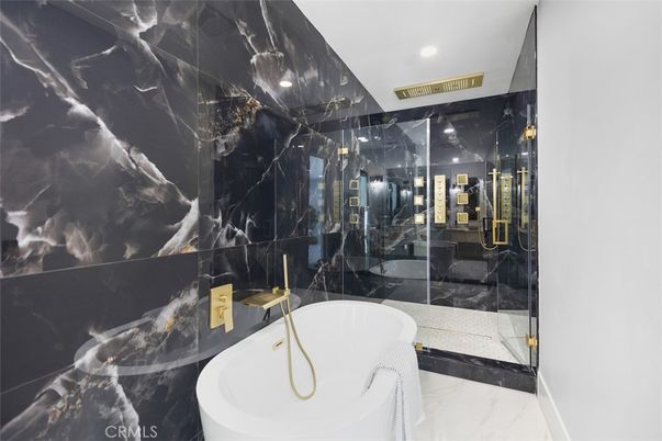 Bathroom, Free Standing Baths, Glass Shower, Interior, Marble, Marble Walls, Recessed Lighting