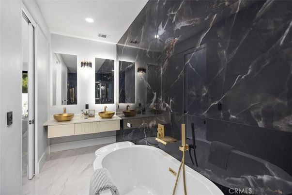 Bathroom, Dual Sink Vanities, Free Standing Baths, Interior, Marble, Marble Walls, Recessed Lighting