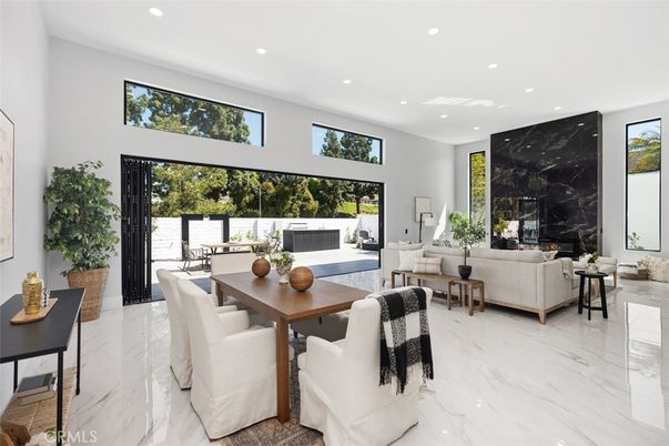 Dining room, Fireplace, Interior, Kitchen, Living room, Marble Walls, Recessed Lighting, Stainless Steel Appliances