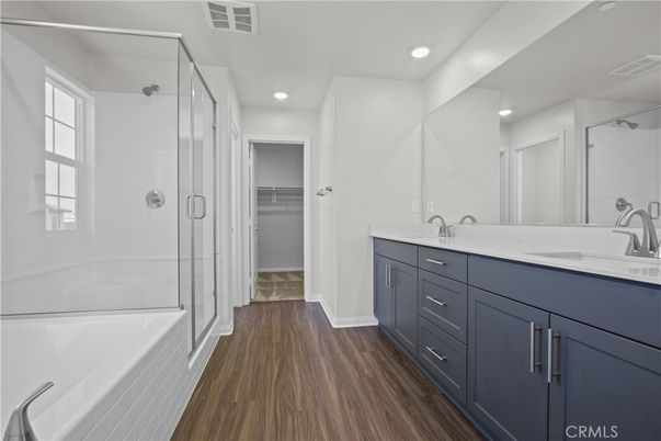 Bathroom, Dual Sink Vanities, Glass Shower, Interior, Recessed Lighting, Wood Texture Flooring