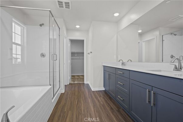 Bathroom, Dual Sink Vanities, Glass Shower, Interior, Recessed Lighting, Wood Texture Flooring