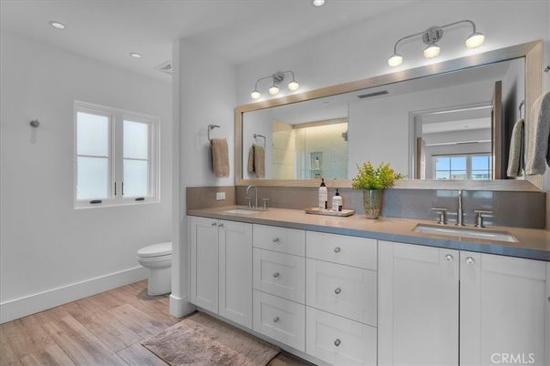 Bathroom, Dual Sink Vanities, Interior, Recessed Lighting, Wood Texture Flooring