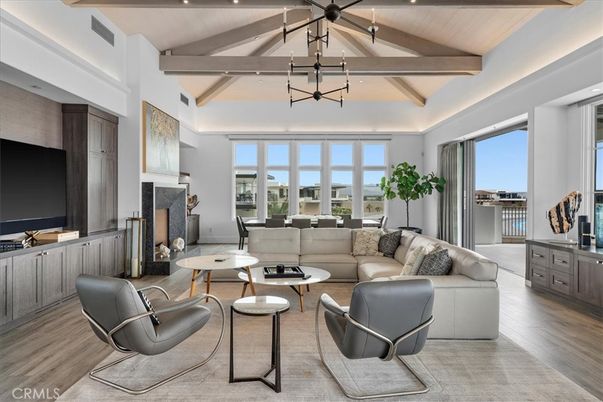 Fireplace, Interior, Living room, Pendant Lights, Recessed Lighting, Water, Wooden Beams, Wood Texture Flooring