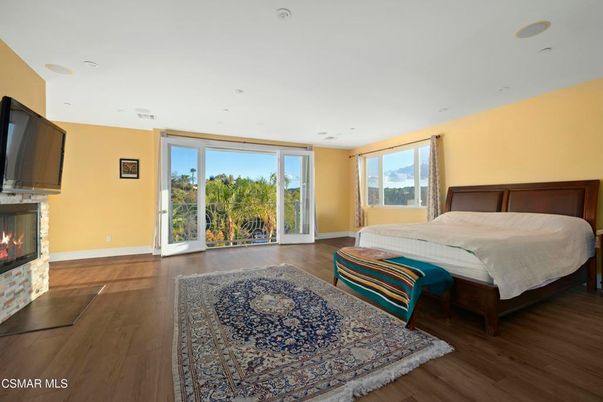 Bedroom, Fireplace, Interior, Recessed Lighting, Wood Texture Flooring
