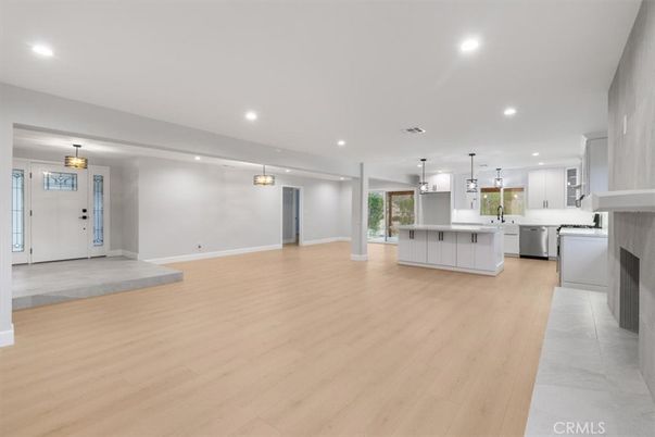 Fireplace, Interior, Kitchen, Pendant Lights, Recessed Lighting, Stainless Steel Appliances, Wood Texture Flooring