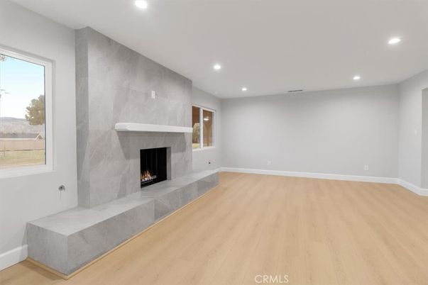 Empty room, Fireplace, Interior, Recessed Lighting, Wood Texture Flooring