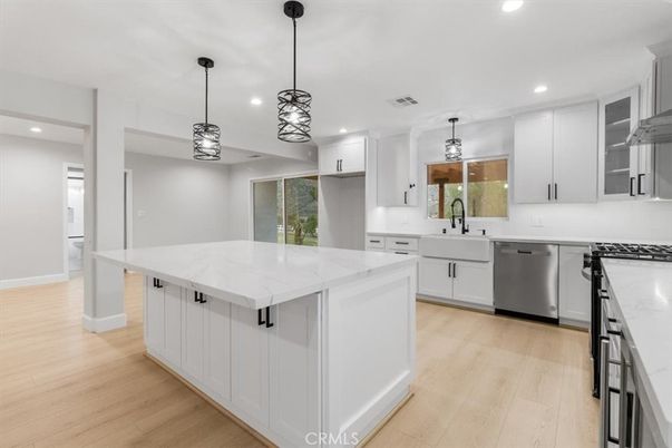 Interior, Kitchen, Pendant Lights, Recessed Lighting, Stainless Steel Appliances, Wood Texture Flooring