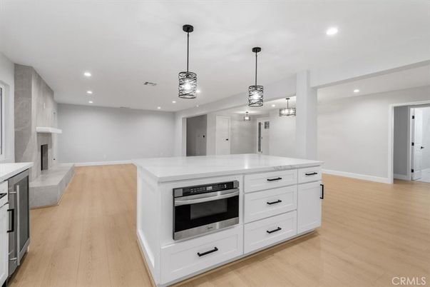Fireplace, Interior, Kitchen, Pendant Lights, Recessed Lighting, Wood Texture Flooring