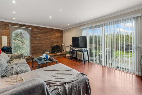 Fireplace, Interior, Living room, Recessed Lighting, Stone Walls, Wood Texture Flooring