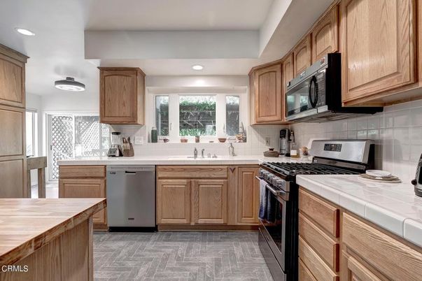 Interior, Kitchen, Recessed Lighting, Stainless Steel Appliances, Tile Countertops