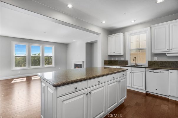 Fireplace, Interior, Kitchen, Recessed Lighting, Wood Texture Flooring