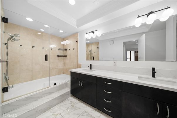 Bathroom, Dual Sink Vanities, Glass Shower, Interior, Marble, Recessed Lighting