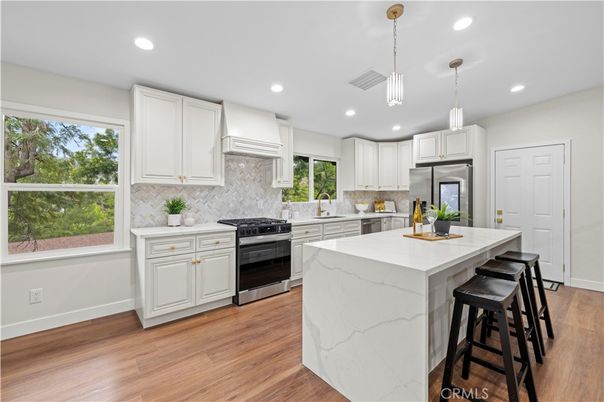 Interior, Kitchen, Pendant Lights, Recessed Lighting, Stainless Steel Appliances, Wood Texture Flooring