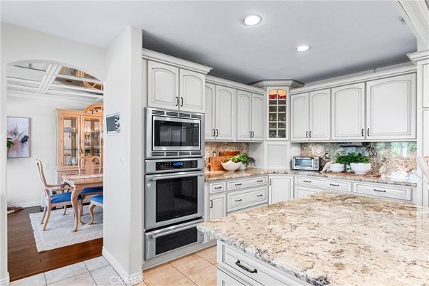 Dining room, Interior, Kitchen, Recessed Lighting, Stainless Steel Appliances, Wood Texture Flooring