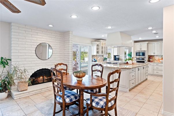 Dining room, Fireplace, Interior, Kitchen, Recessed Lighting, Stainless Steel Appliances, Stone Walls
