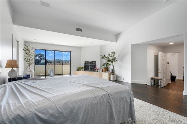 Bedroom, Fireplace, Interior, Recessed Lighting, Wood Texture Flooring