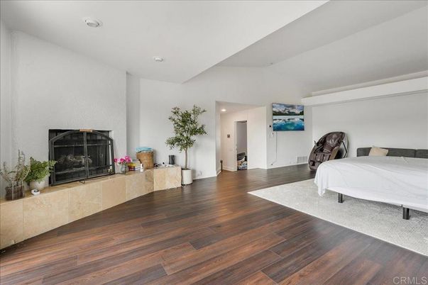 Bedroom, Fireplace, Interior, Recessed Lighting, Wood Texture Flooring