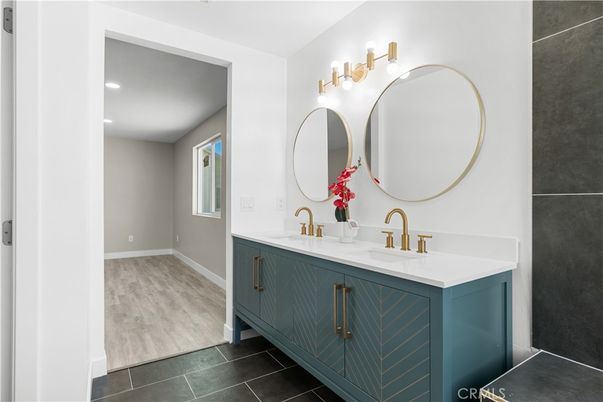 Bathroom, Dual Sink Vanities, Interior, Recessed Lighting, Wood Texture Flooring
