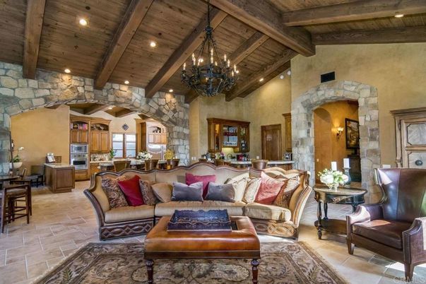 Chandelier, Interior, Kitchen, Living room, Recessed Lighting, Stainless Steel Appliances, Stone Walls, Wooden Beams, Wooden Ceilings
