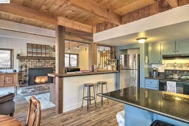 Fireplace, Interior, Kitchen, Pendant Lights, Stainless Steel Appliances, Wooden Beams, Wooden Ceilings, Wood Texture Flooring