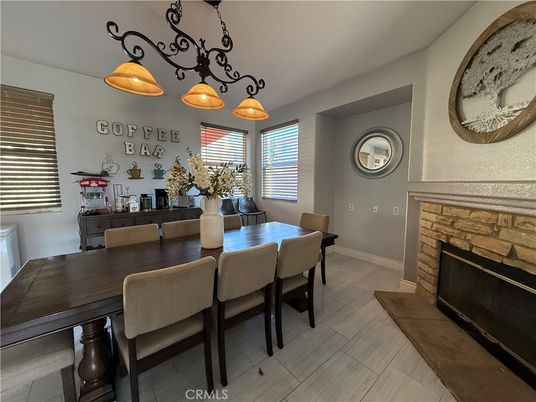 Dining room, Fireplace, Interior, Pendant Lights, Wood Texture Flooring